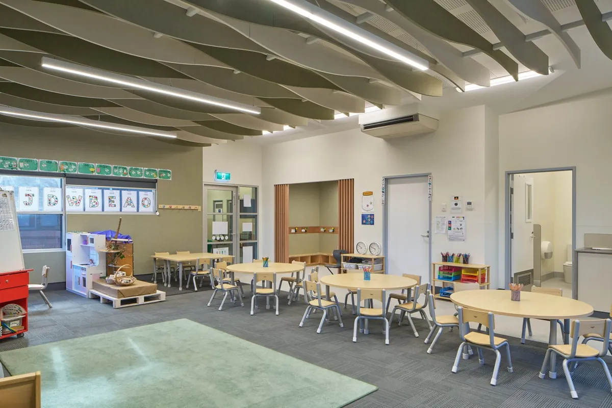 Bright refurbished classroom at Gagebrook Primary School with timber ceiling baffles